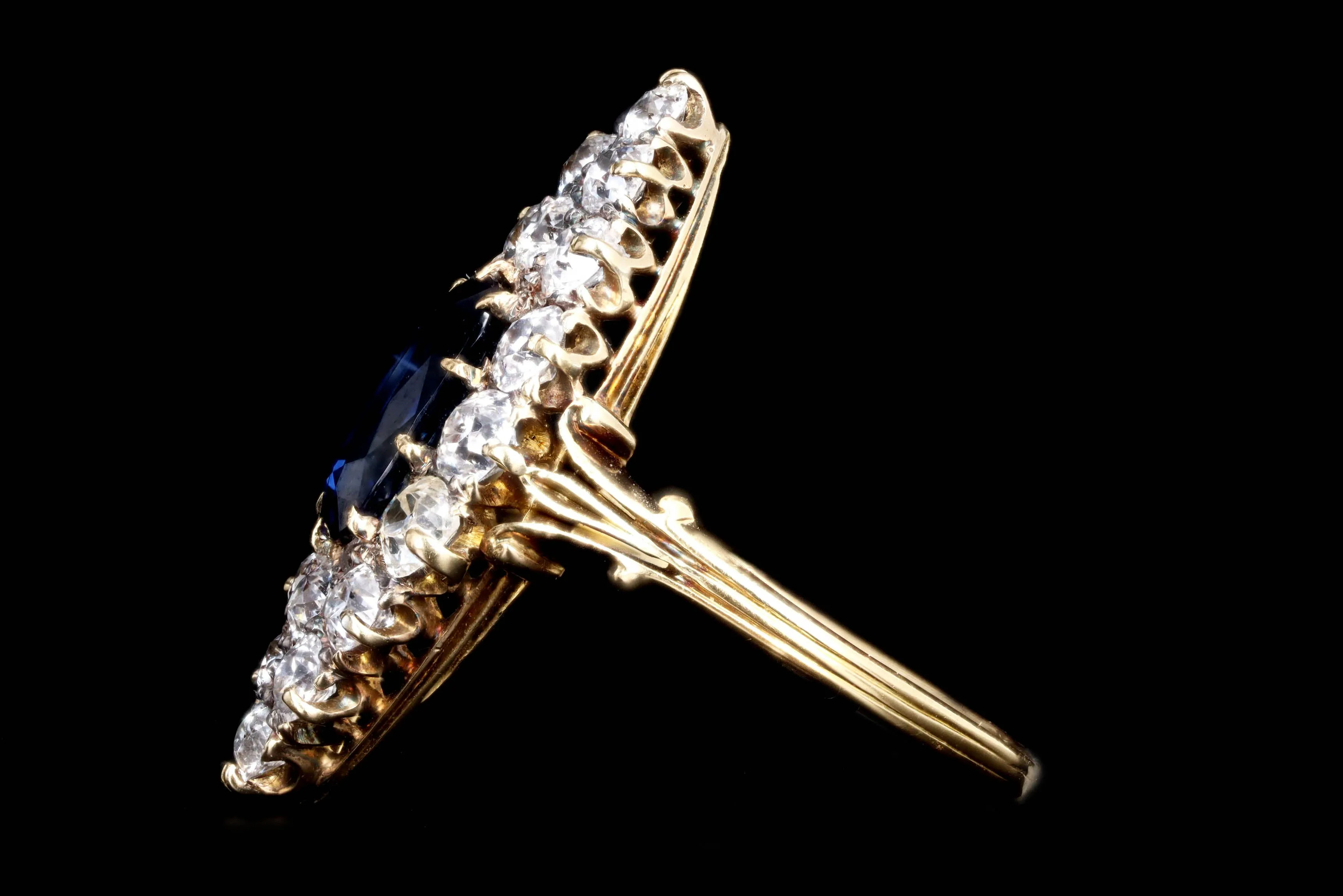 Antique Edwardian 18K Yellow Gold 1.25 Carat Ceylon Blue Sapphire and Old European Cut Diamond Navette Ring