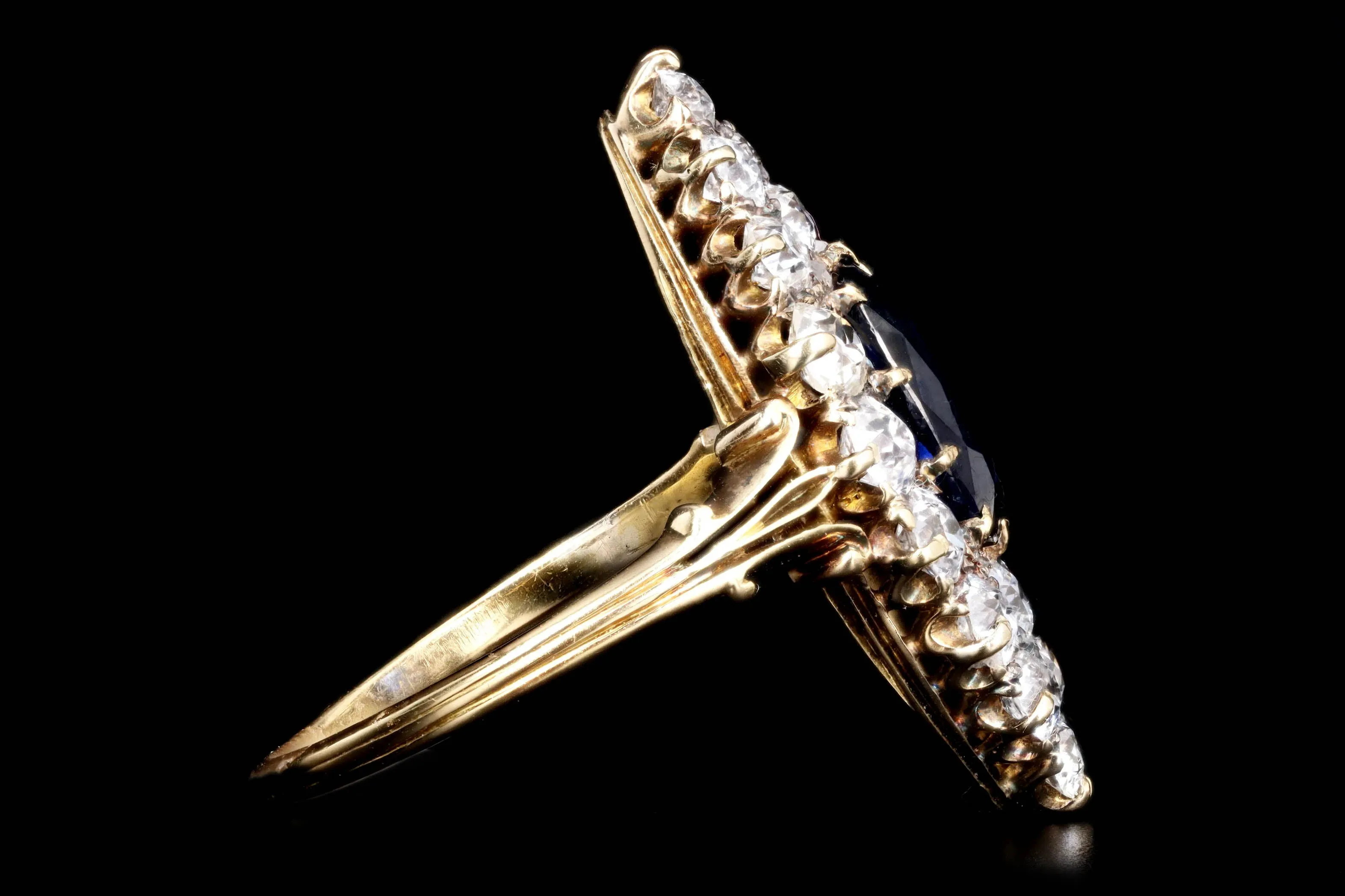 Antique Edwardian 18K Yellow Gold 1.25 Carat Ceylon Blue Sapphire and Old European Cut Diamond Navette Ring