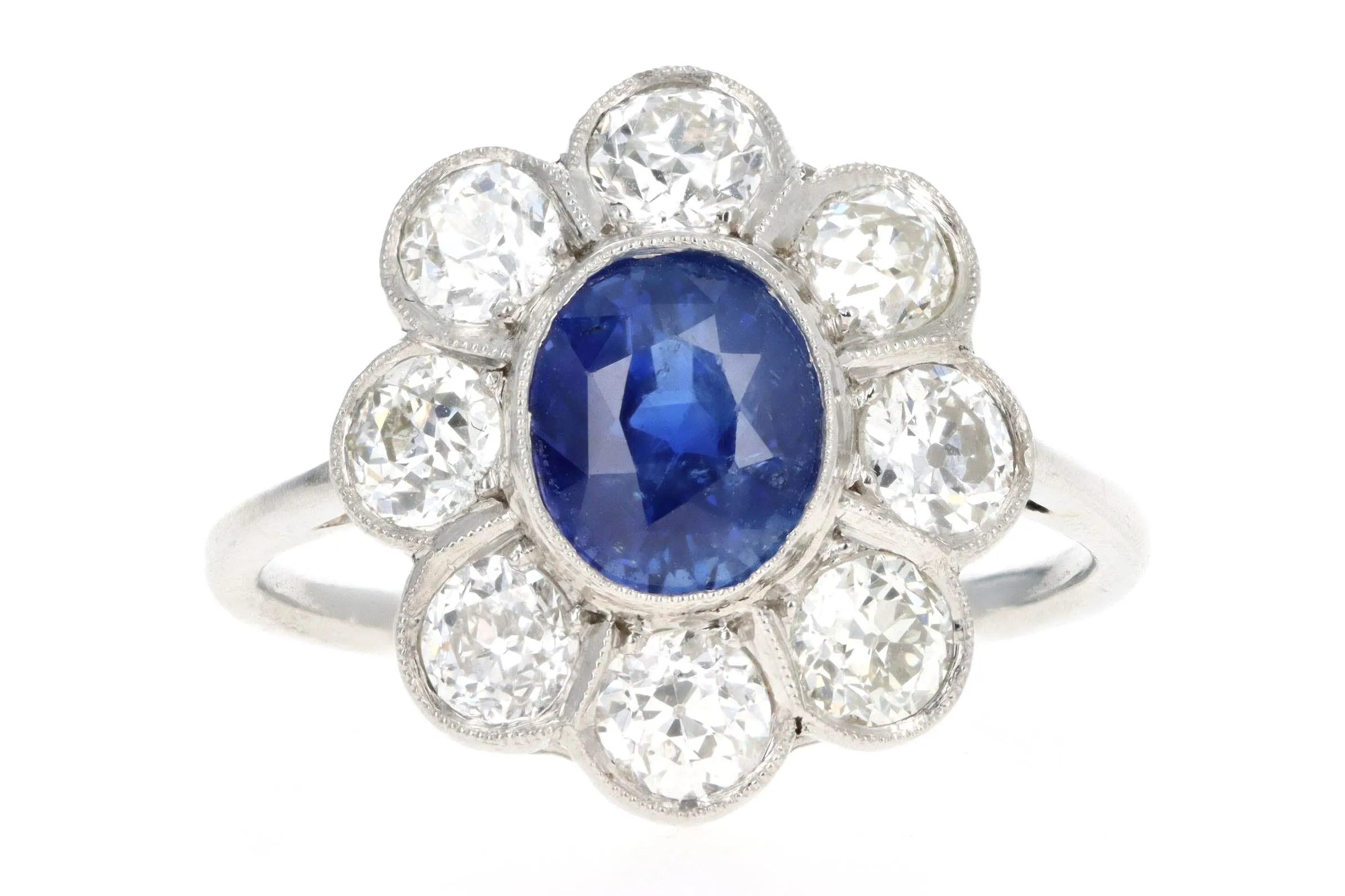 Art Deco Inspired Platinum 2.21 Carat Oval Cut Natural Sapphire & Old European Cut Diamond Halo Cluster Ring