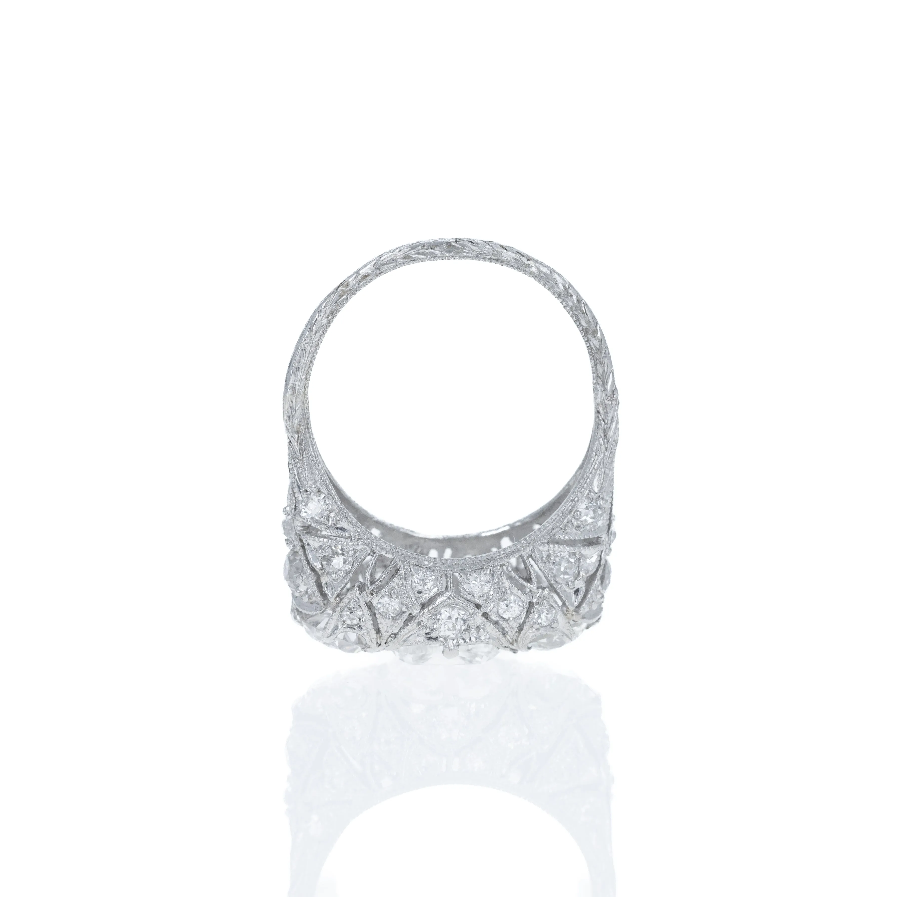 Art Deco Platinum 1.51 Carat Old Mine Diamond Three Stone Filigree Ring