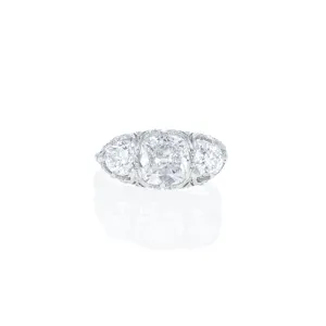 Art Deco Platinum 1.51 Carat Old Mine Diamond Three Stone Filigree Ring