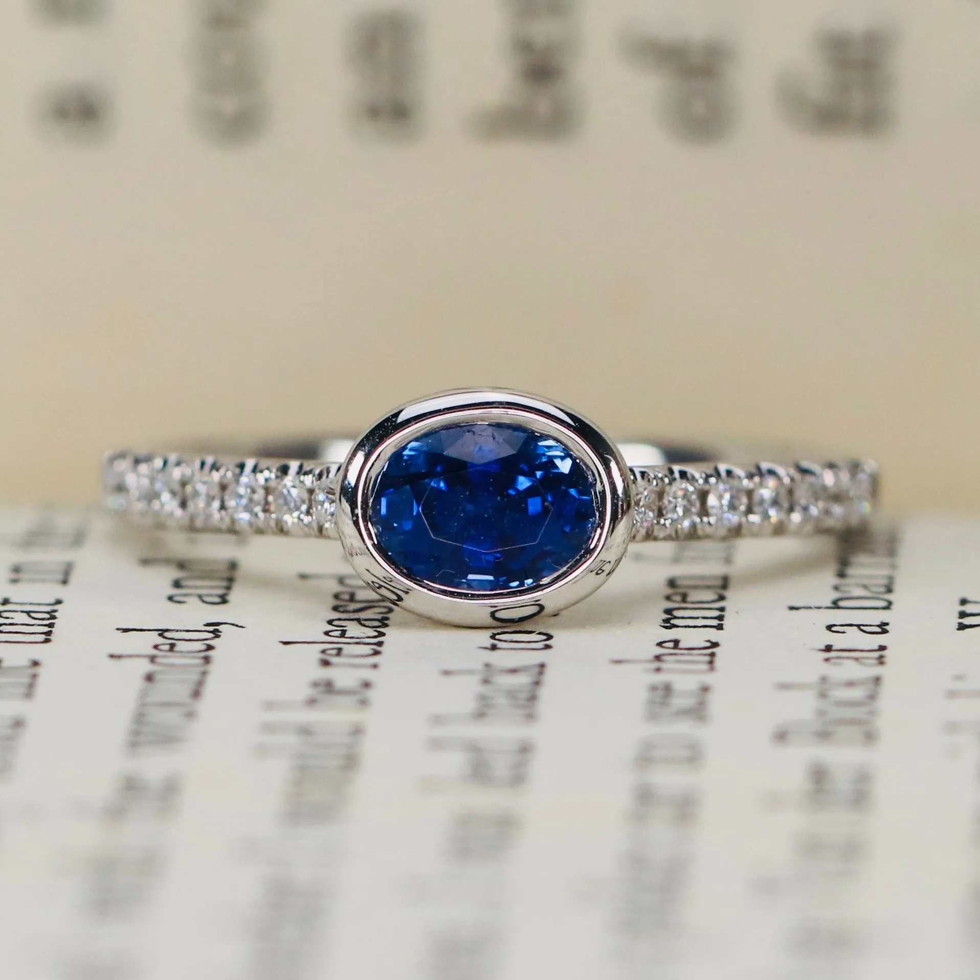 East west blue Sapphire and diamond ring in 14k white gold