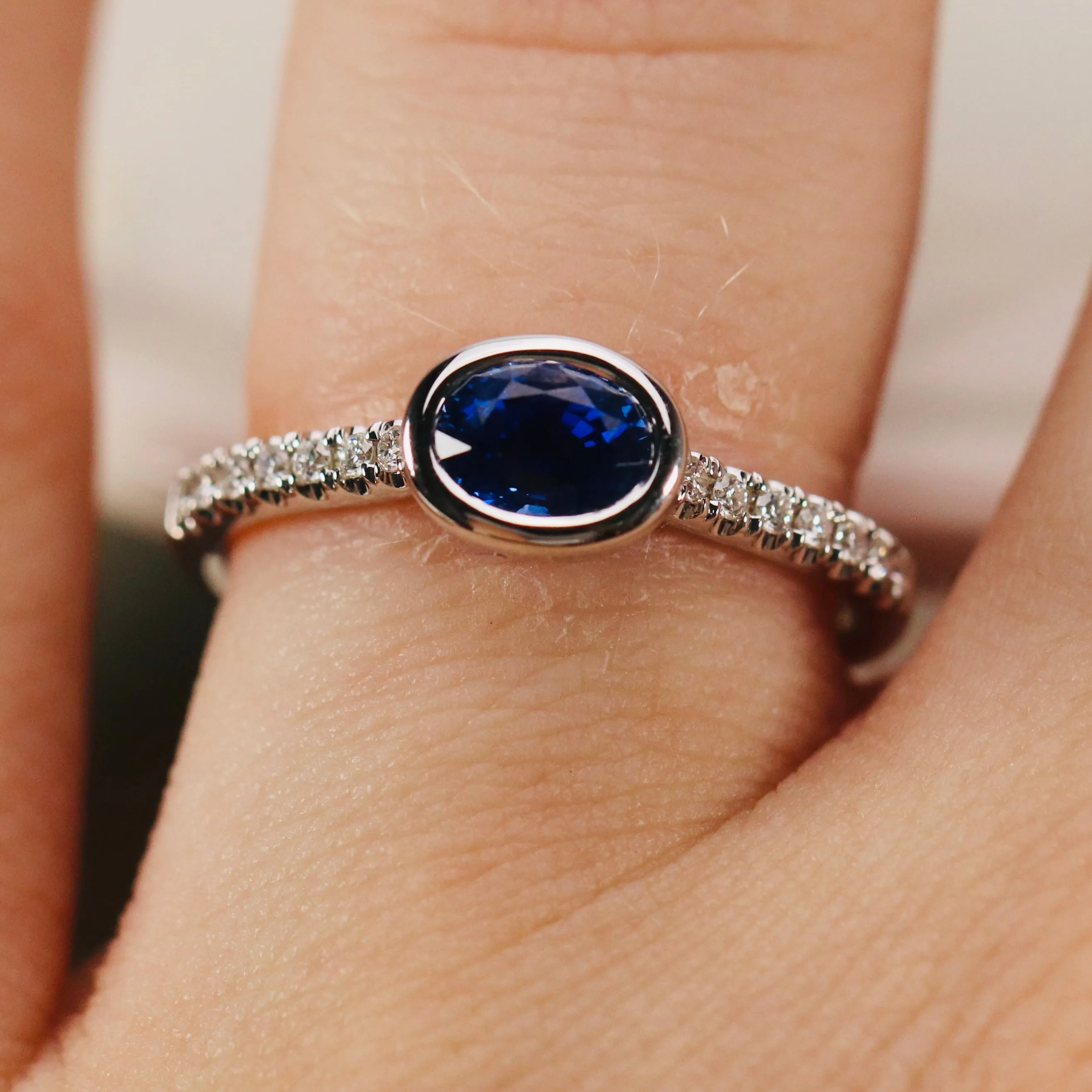 East west blue Sapphire and diamond ring in 14k white gold
