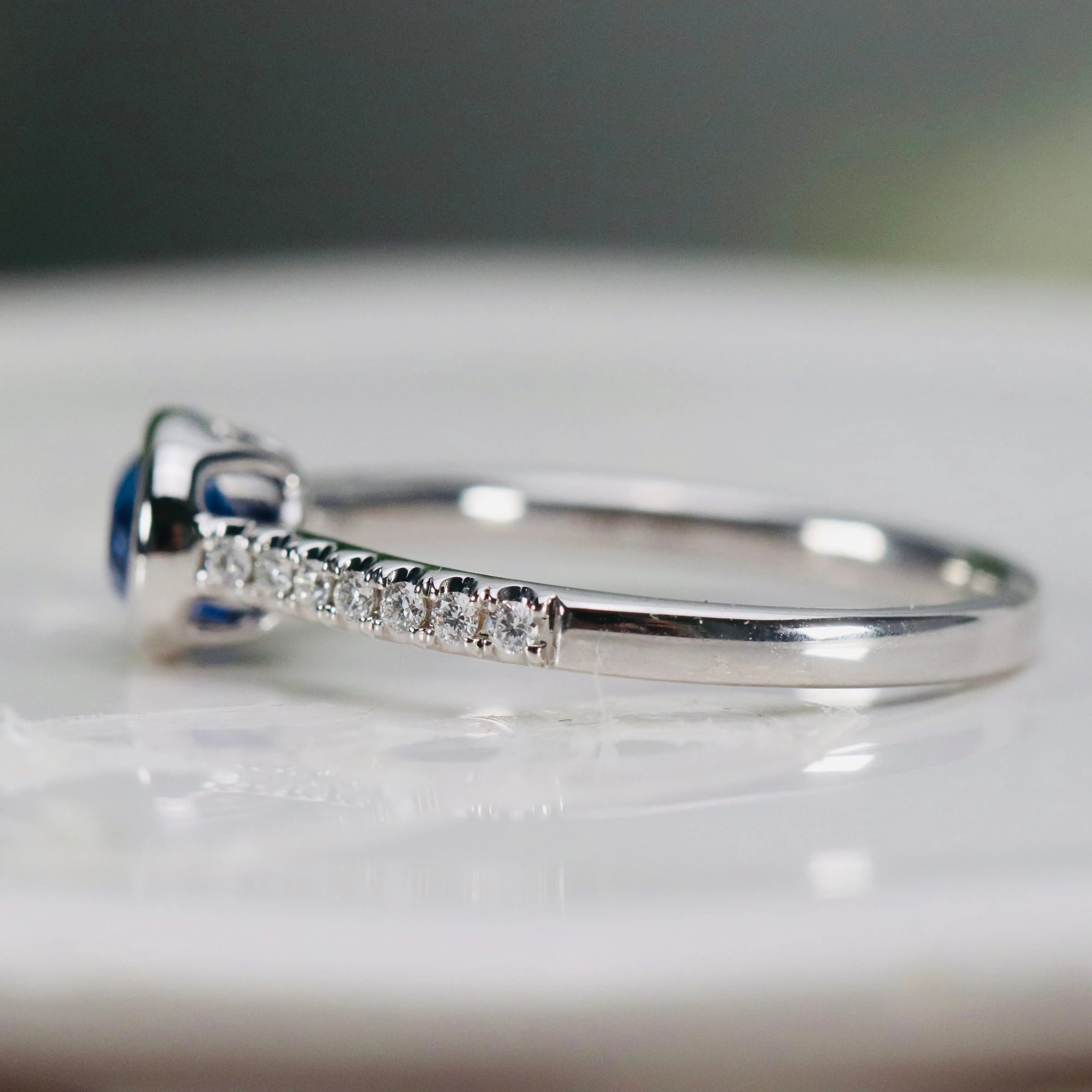 East west blue Sapphire and diamond ring in 14k white gold