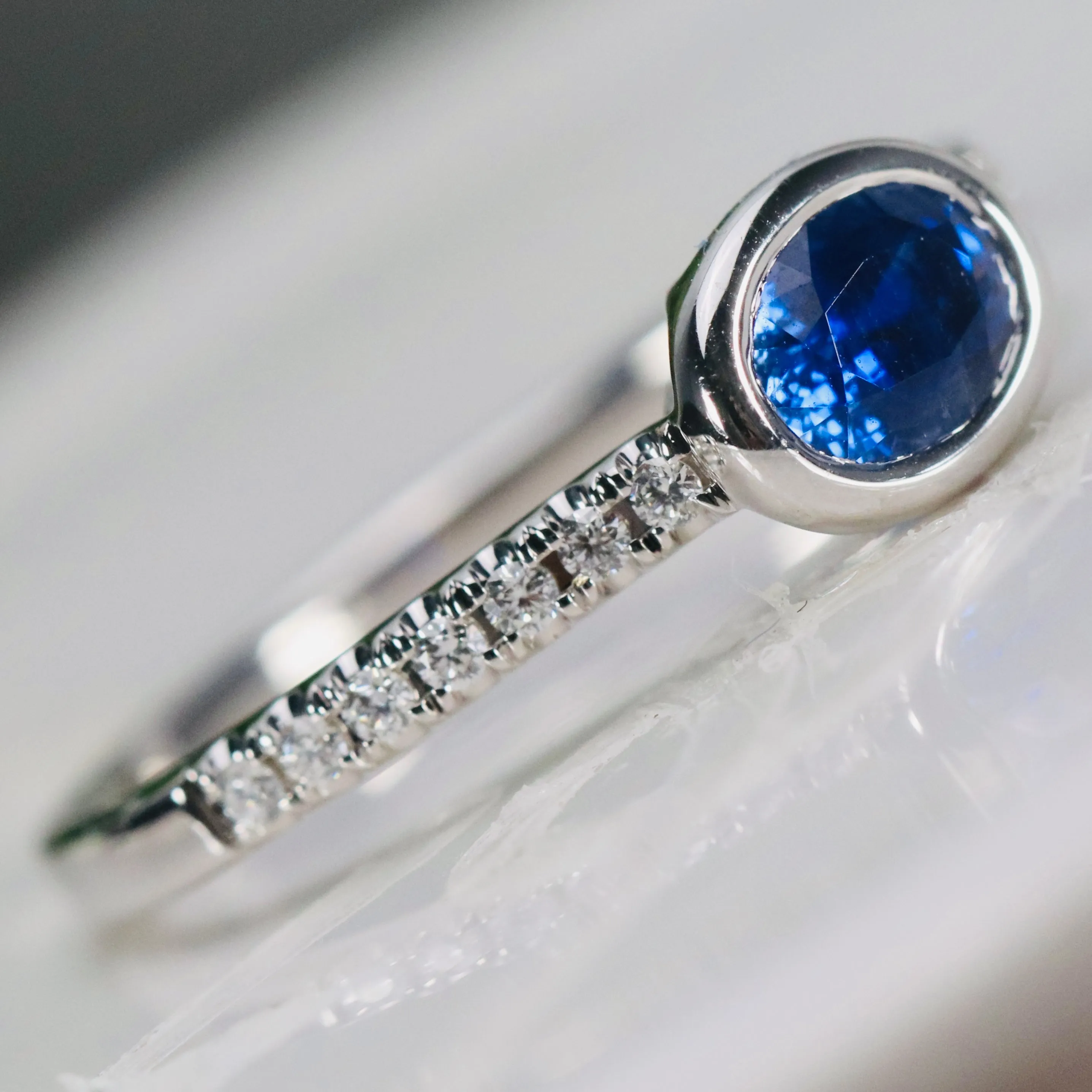 East west blue Sapphire and diamond ring in 14k white gold