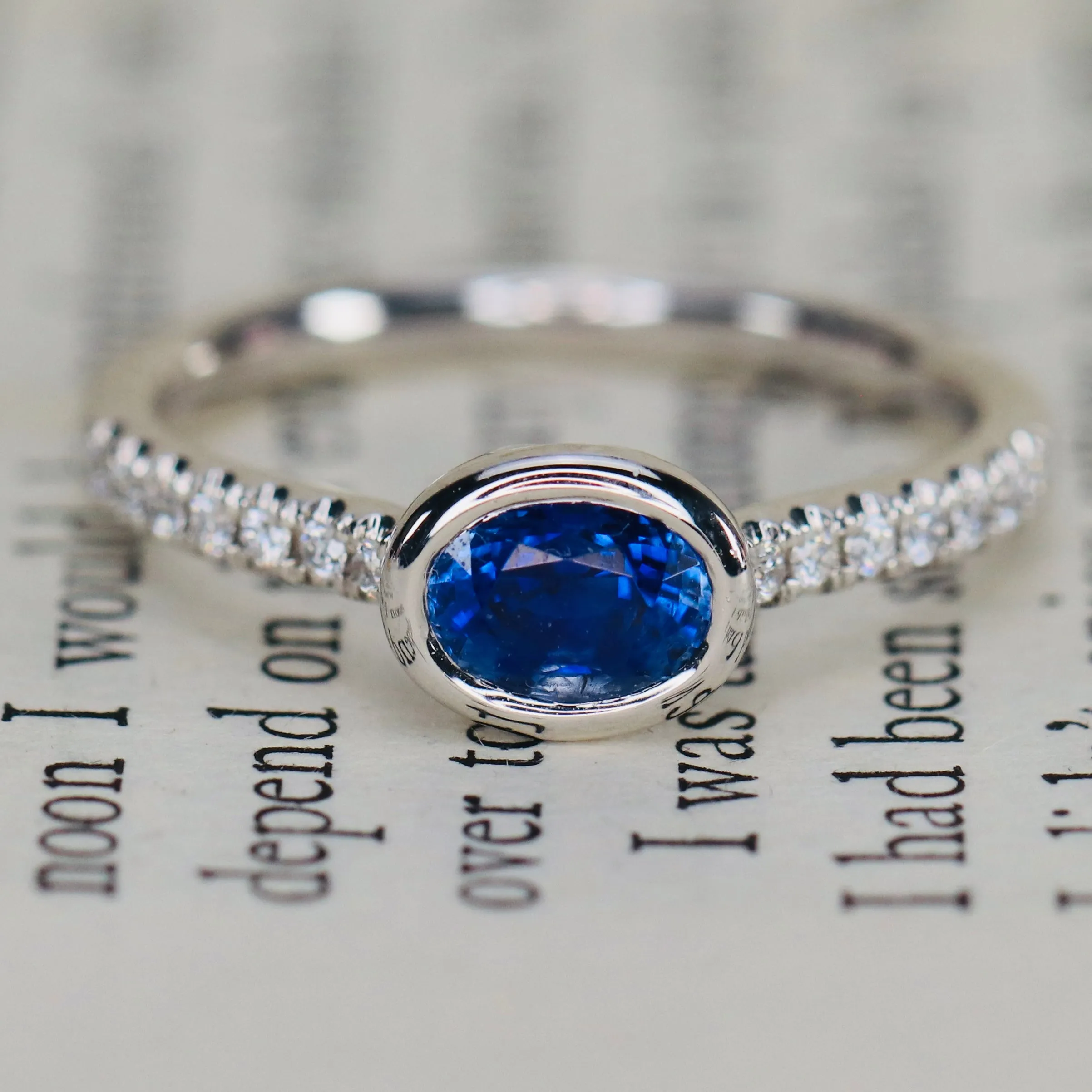 East west blue Sapphire and diamond ring in 14k white gold