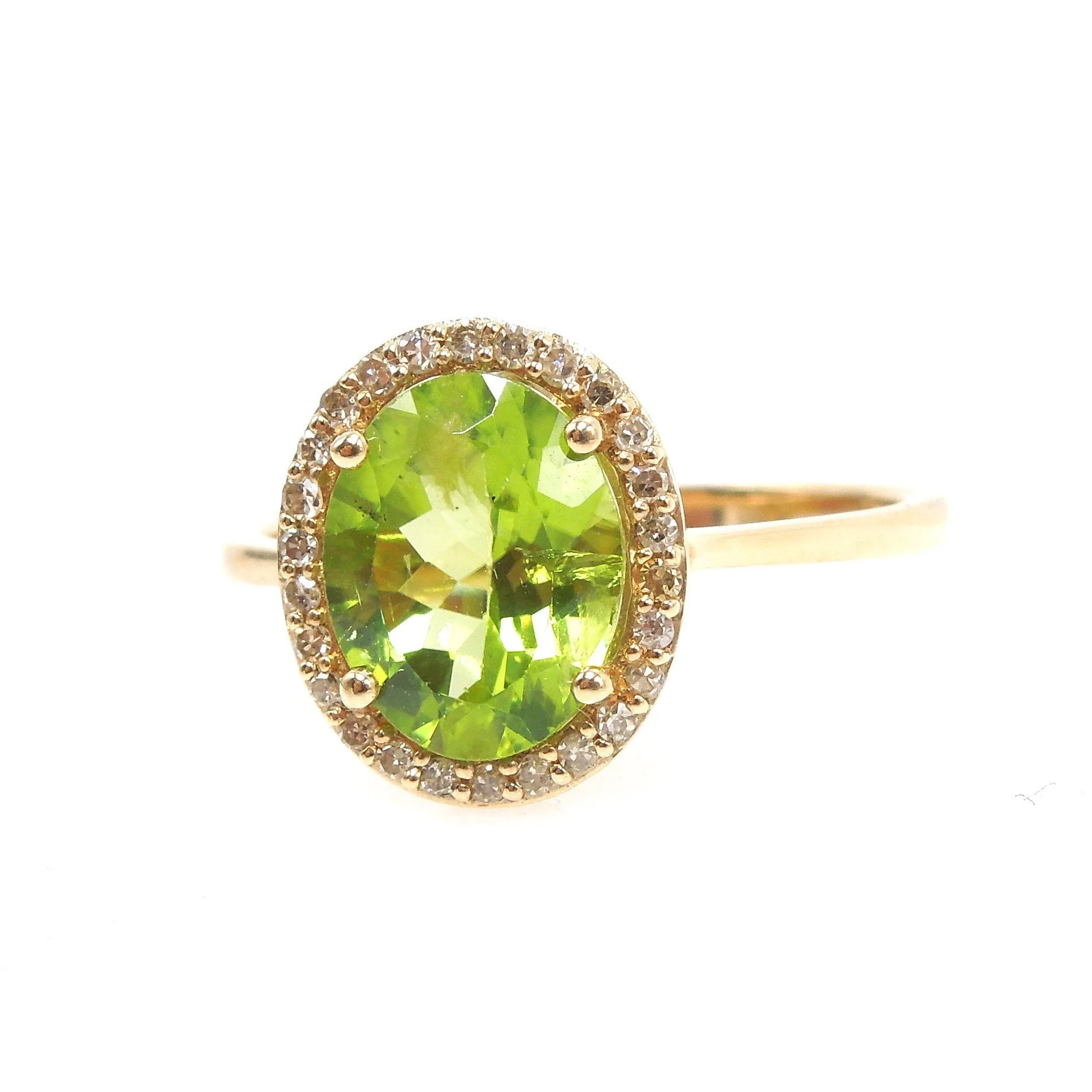 Large Oval Peridot Ring with Diamond Halo in Yellow Gold