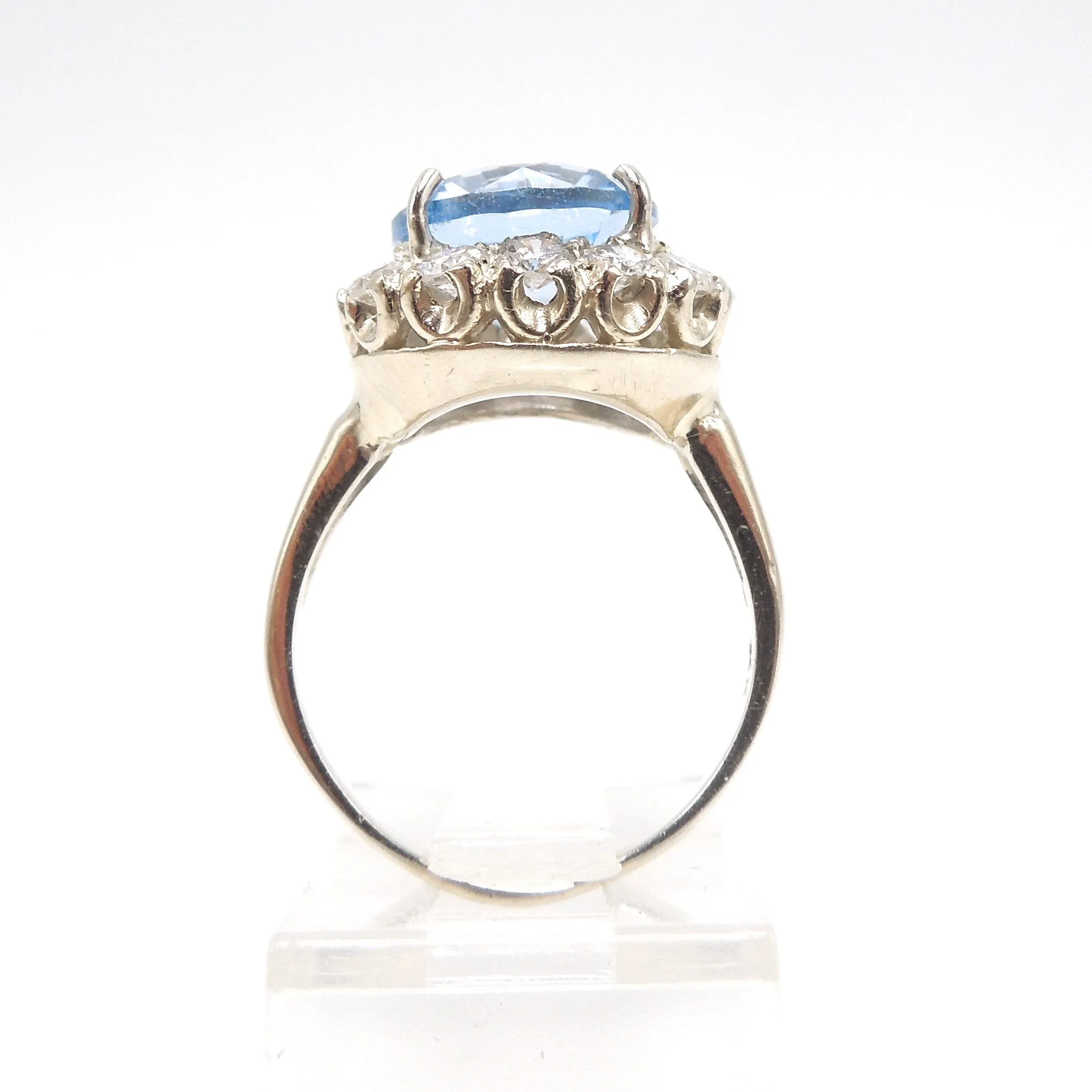 Large Round Blue Spinel Ring Surrounded by Diamond Halo in White Gold
