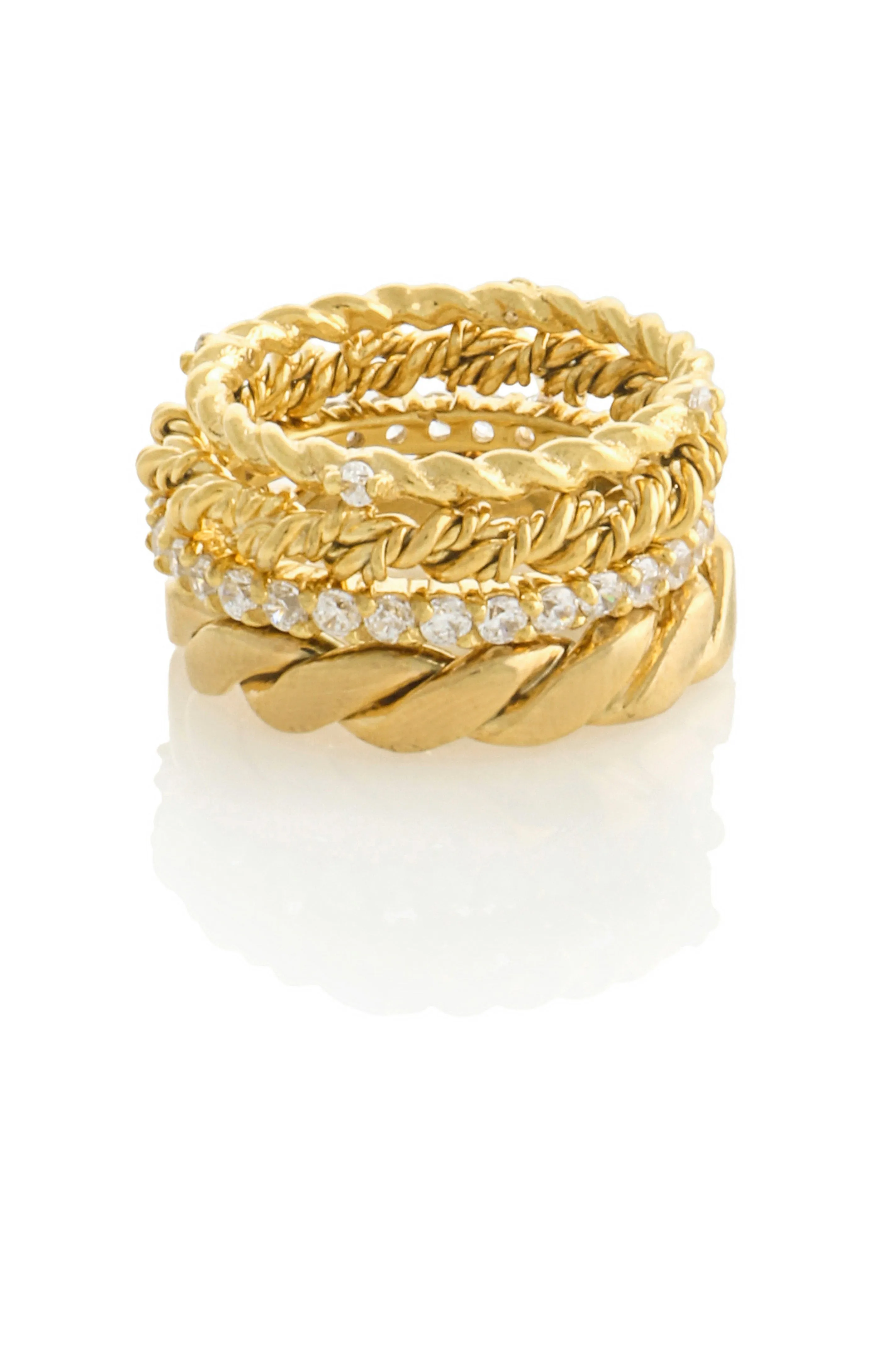 SET OF FOUR MISMATCHED RINGS WITH PAVE STONES