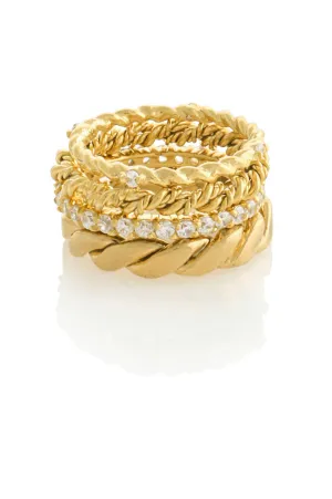 SET OF FOUR MISMATCHED RINGS WITH PAVE STONES