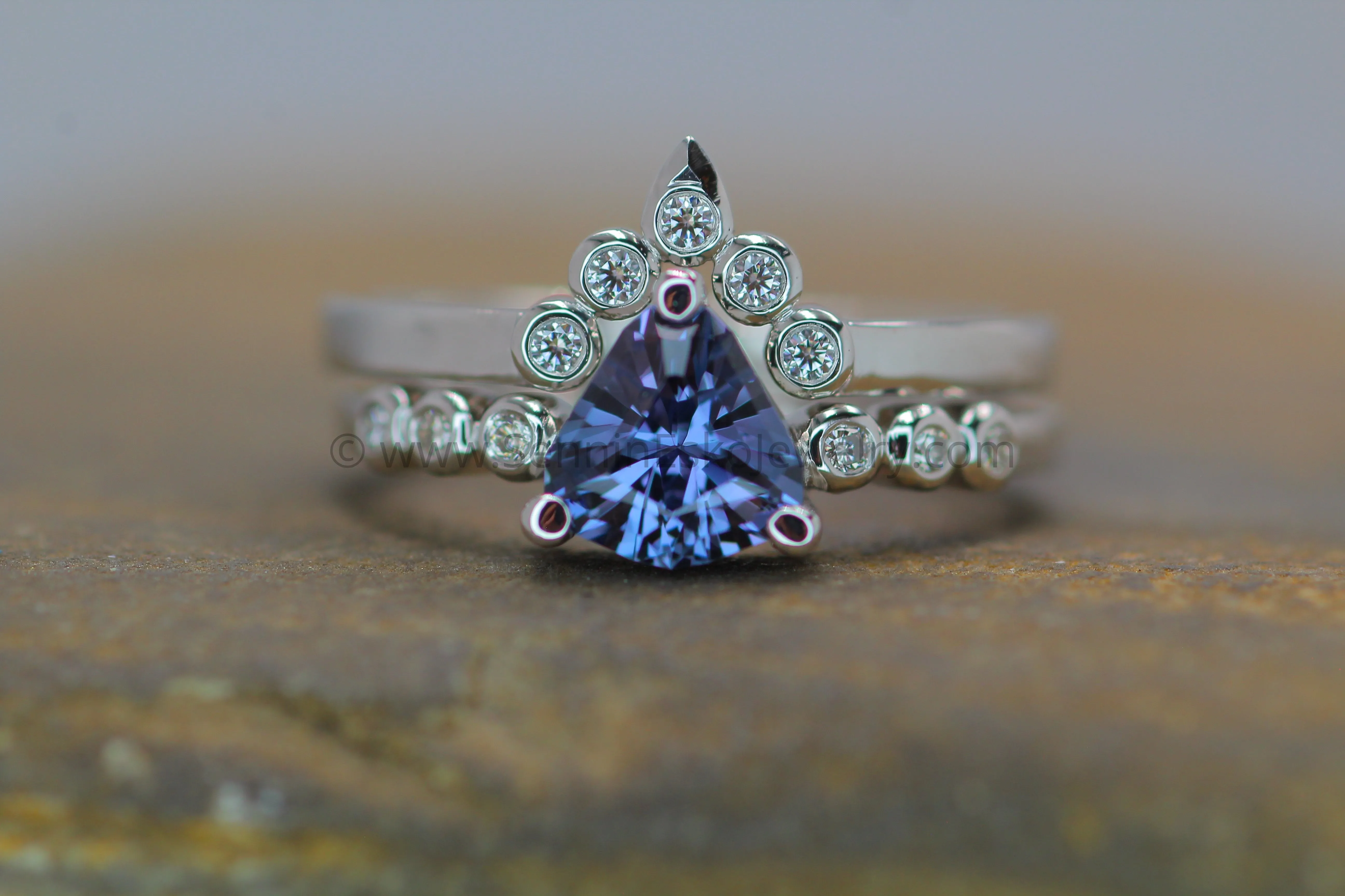 Seven Stone Diamond Accented Prong Platinum Setting - Depicted with a Lilac Spinel (Setting Only, Center Stone Sold Separately)