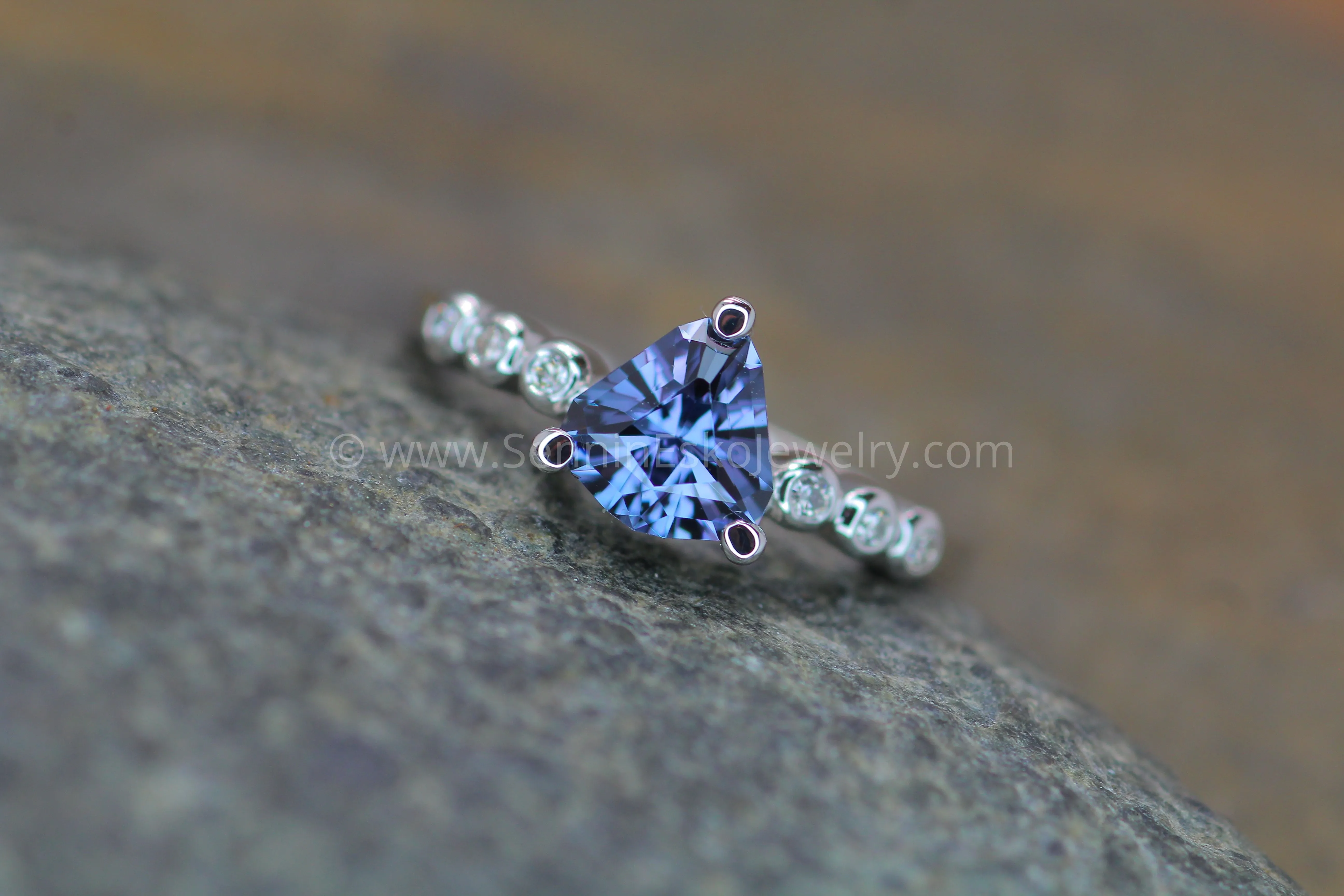Seven Stone Diamond Accented Prong Platinum Setting - Depicted with a Lilac Spinel (Setting Only, Center Stone Sold Separately)