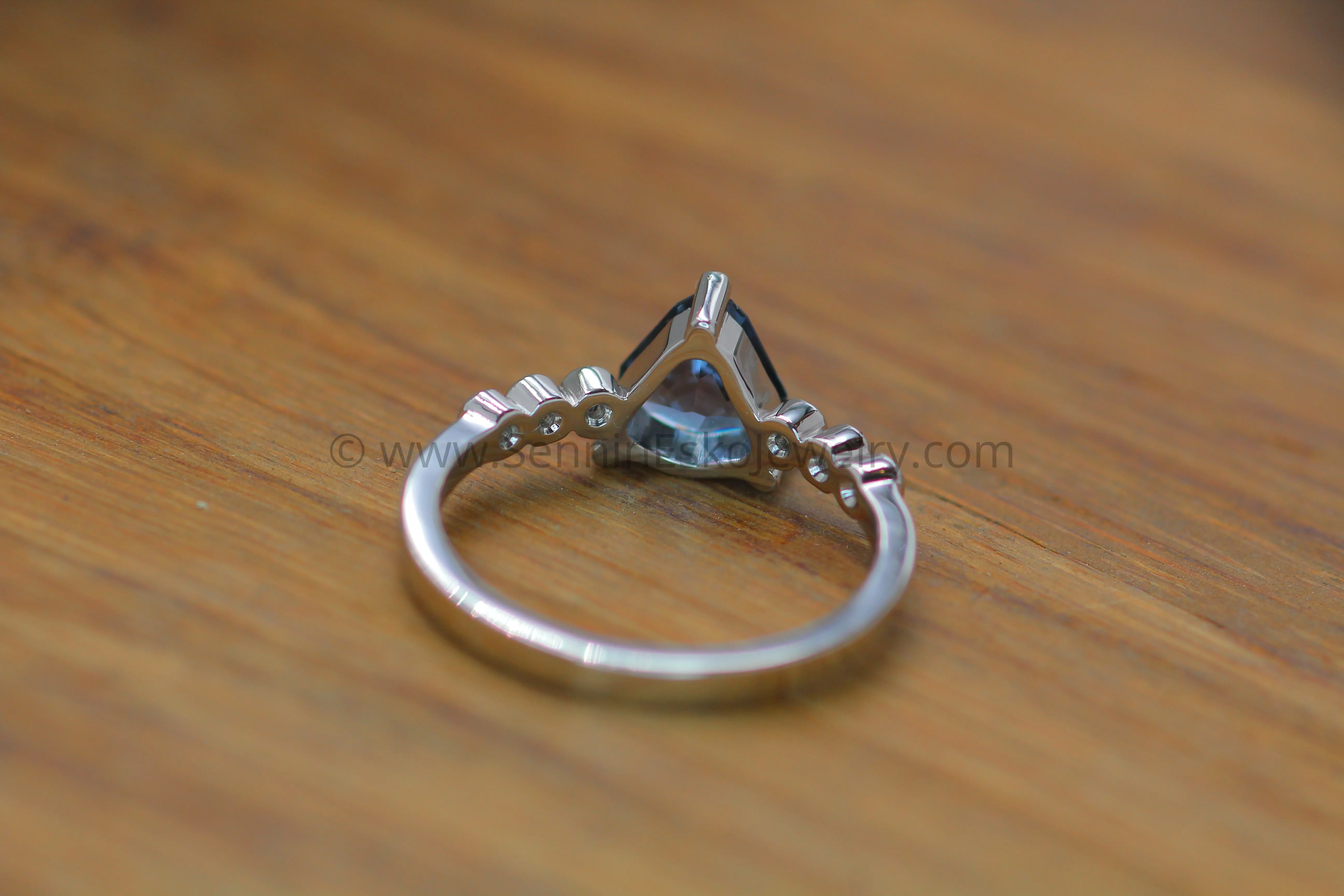 Seven Stone Diamond Accented Prong Platinum Setting - Depicted with a Lilac Spinel (Setting Only, Center Stone Sold Separately)