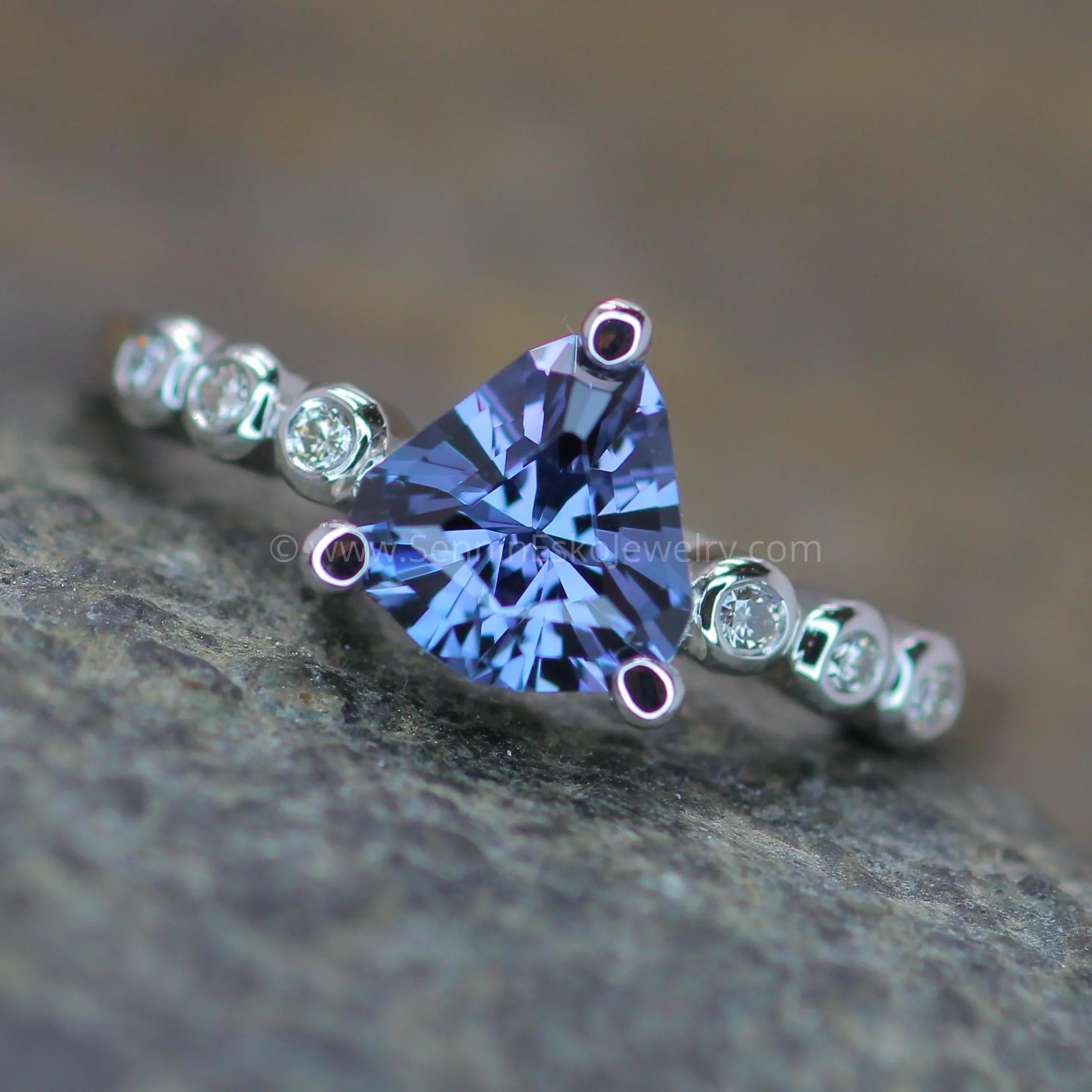 Seven Stone Diamond Accented Prong Platinum Setting - Depicted with a Lilac Spinel (Setting Only, Center Stone Sold Separately)