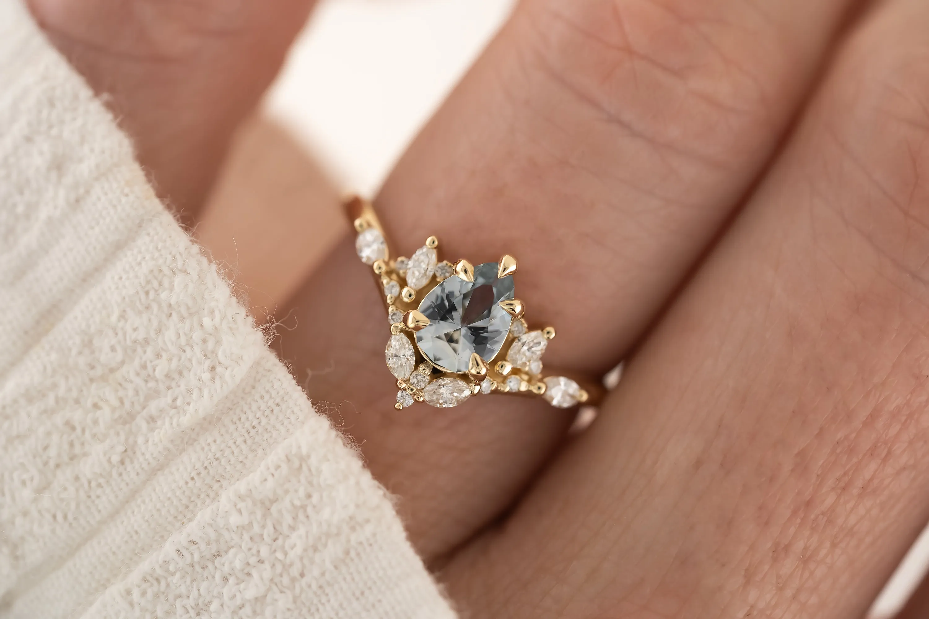 The Aurora Ring - 0.66 CT Pear Light Blue Sapphire