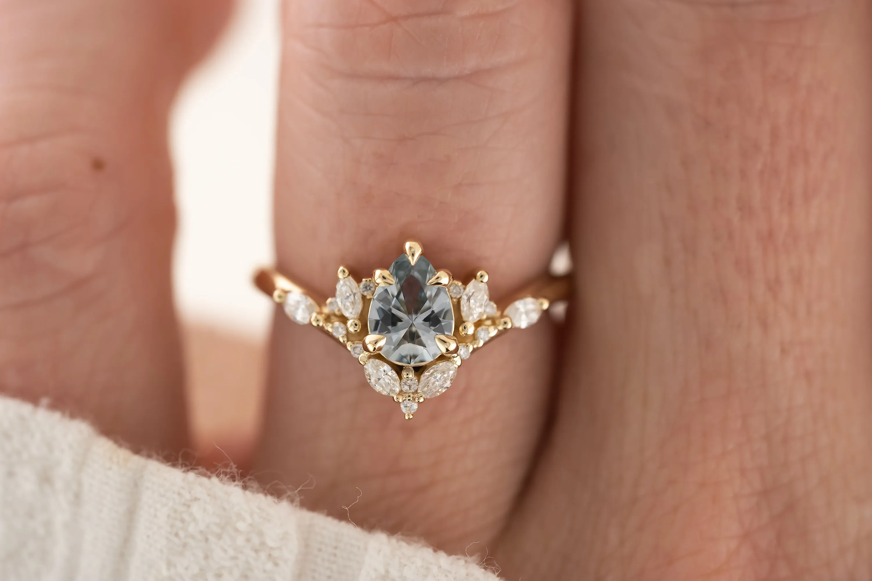 The Aurora Ring - 0.66 CT Pear Light Blue Sapphire