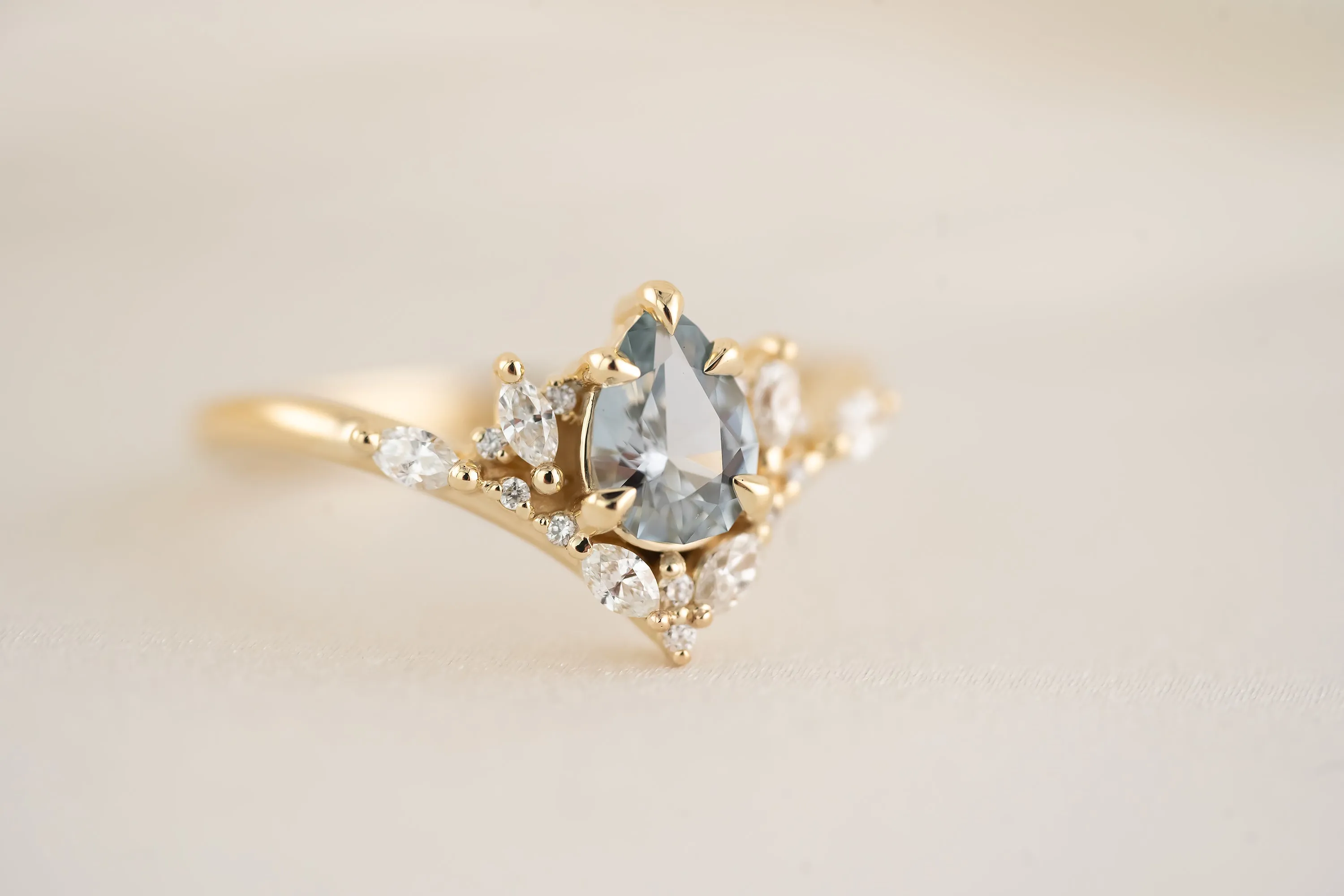 The Aurora Ring - 0.66 CT Pear Light Blue Sapphire