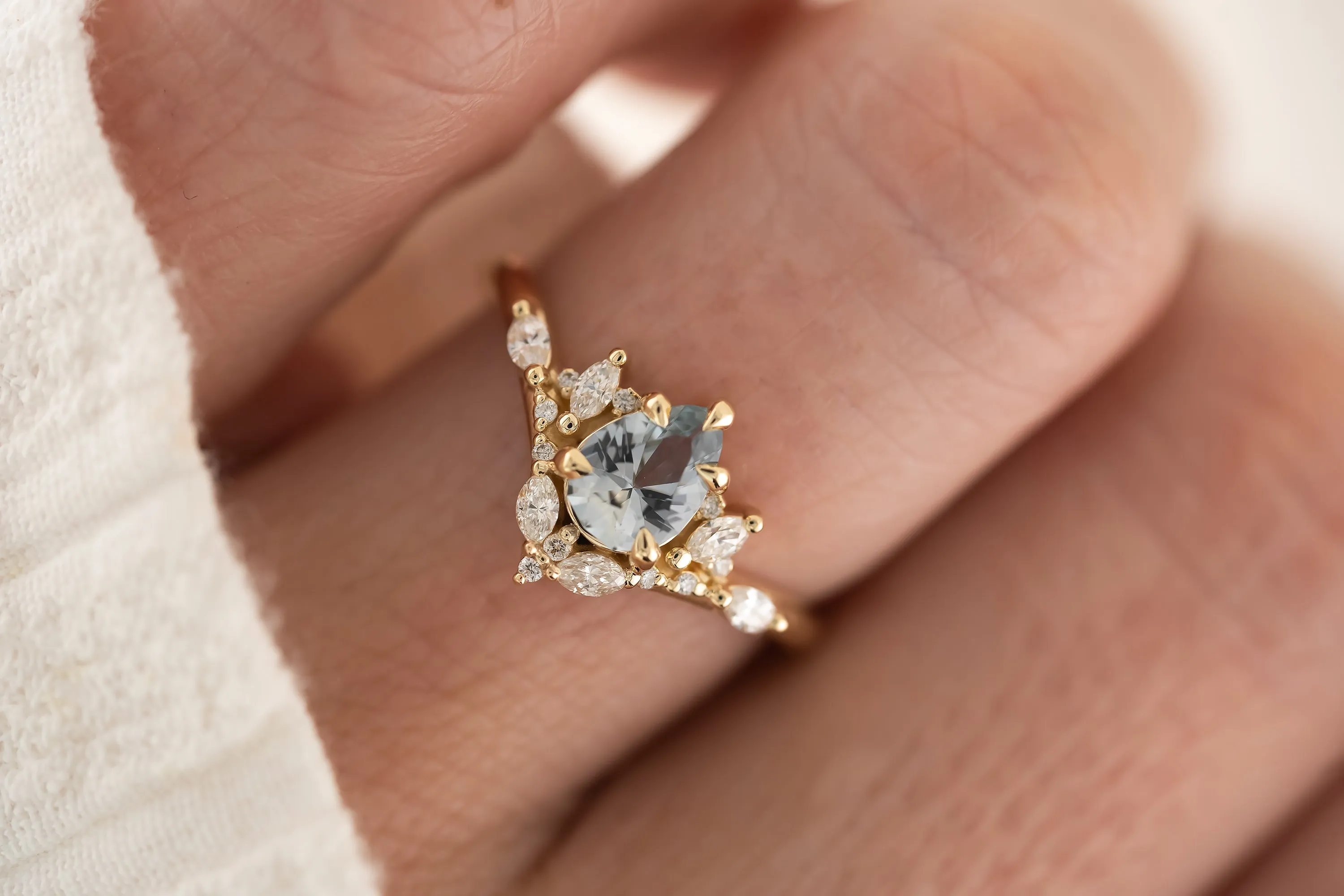 The Aurora Ring - 0.66 CT Pear Light Blue Sapphire