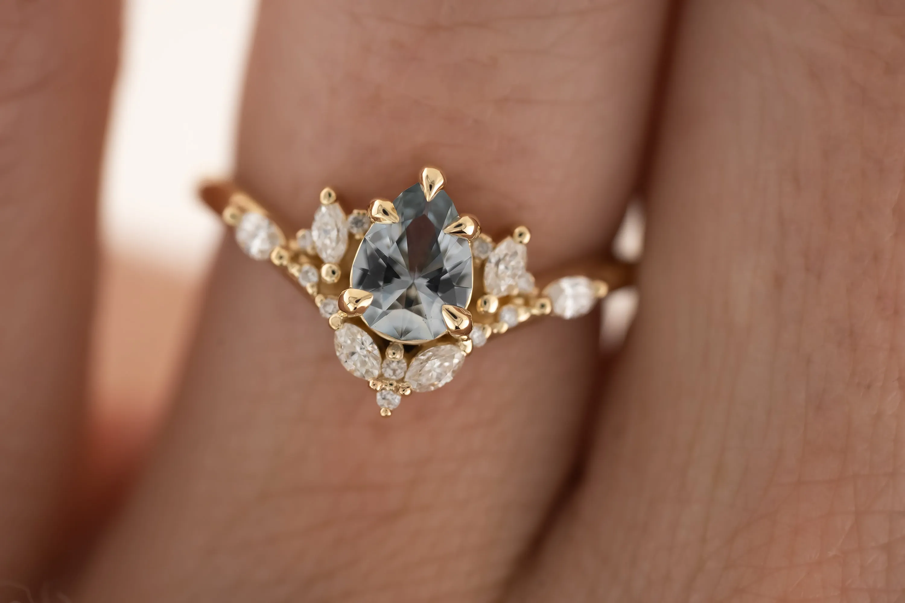 The Aurora Ring - 0.66 CT Pear Light Blue Sapphire