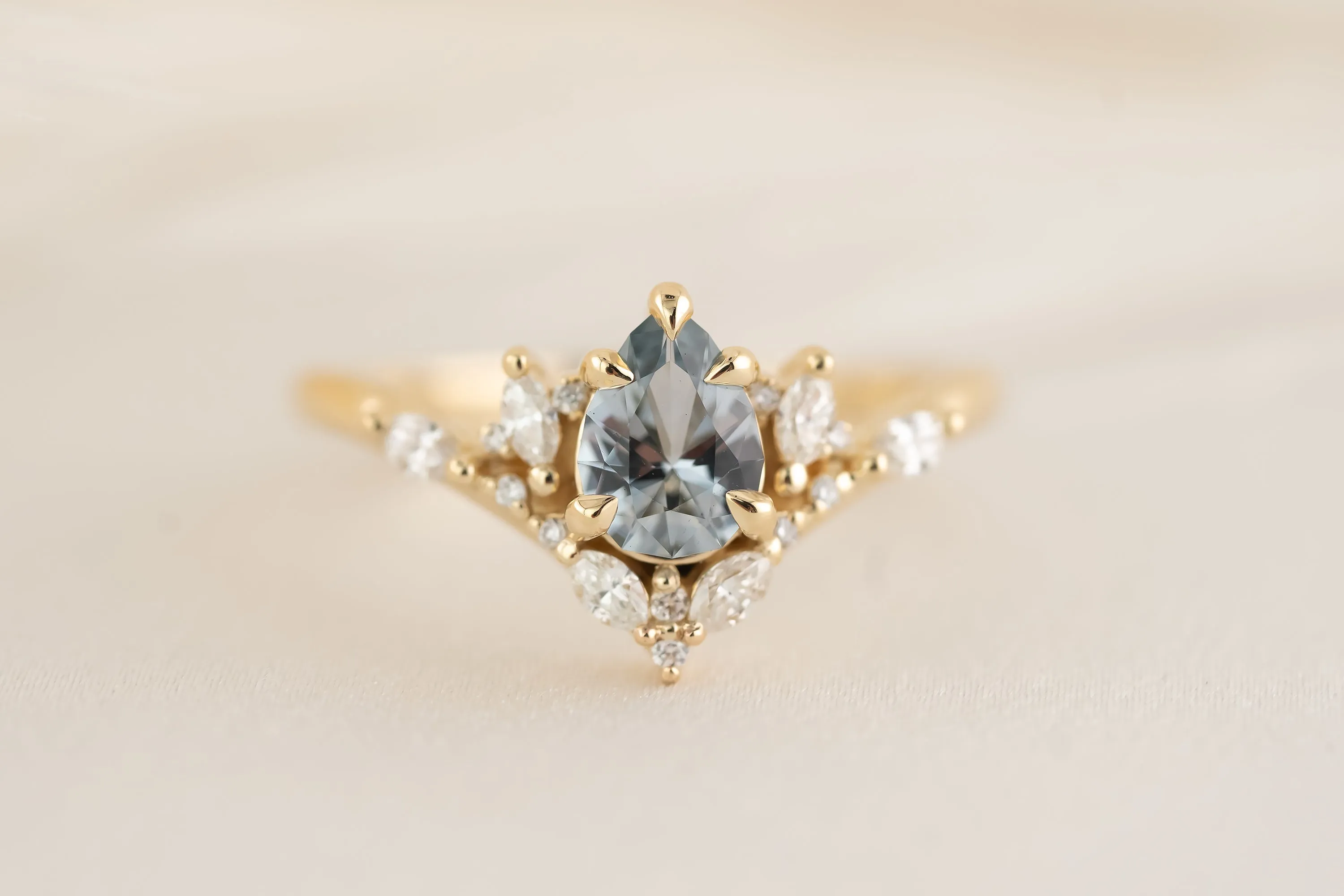 The Aurora Ring - 0.66 CT Pear Light Blue Sapphire