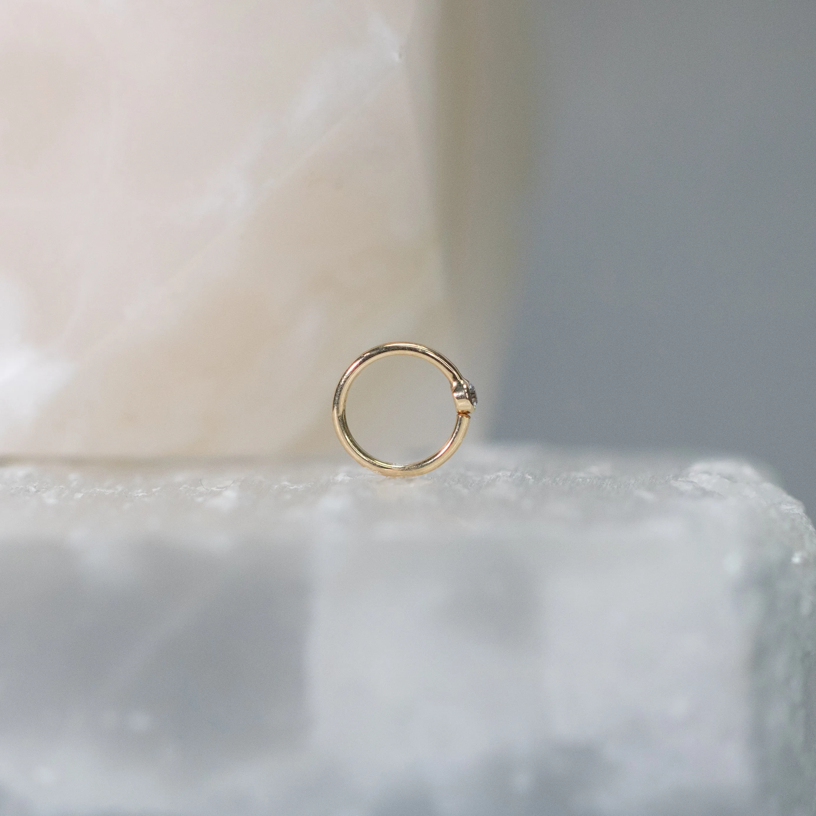 Vertical Fixed Bead Ring with CZ Bezel