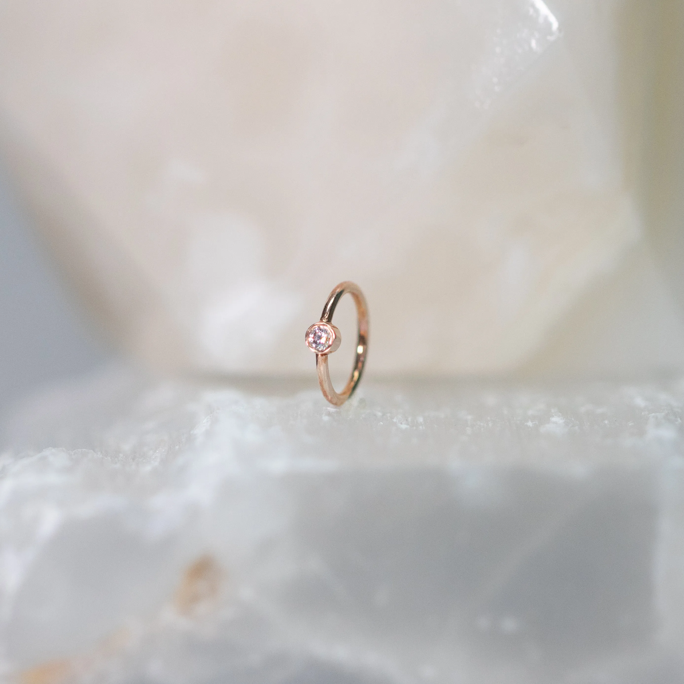 Vertical Fixed Bead Ring with CZ Bezel