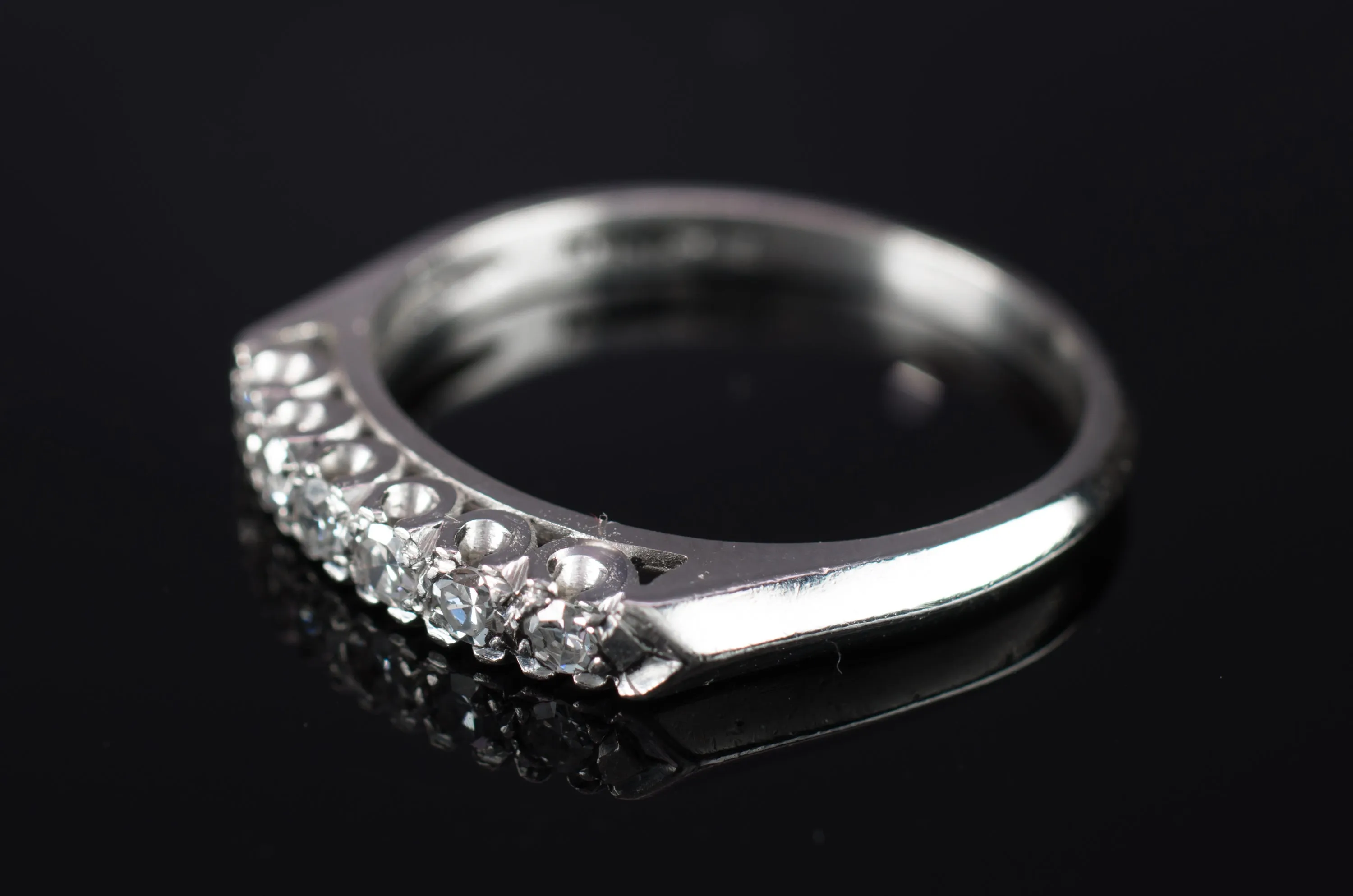 VINTAGE PLATINUM AND SINGLE CUT DIAMOND HALF BAND
