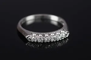 VINTAGE PLATINUM AND SINGLE CUT DIAMOND HALF BAND