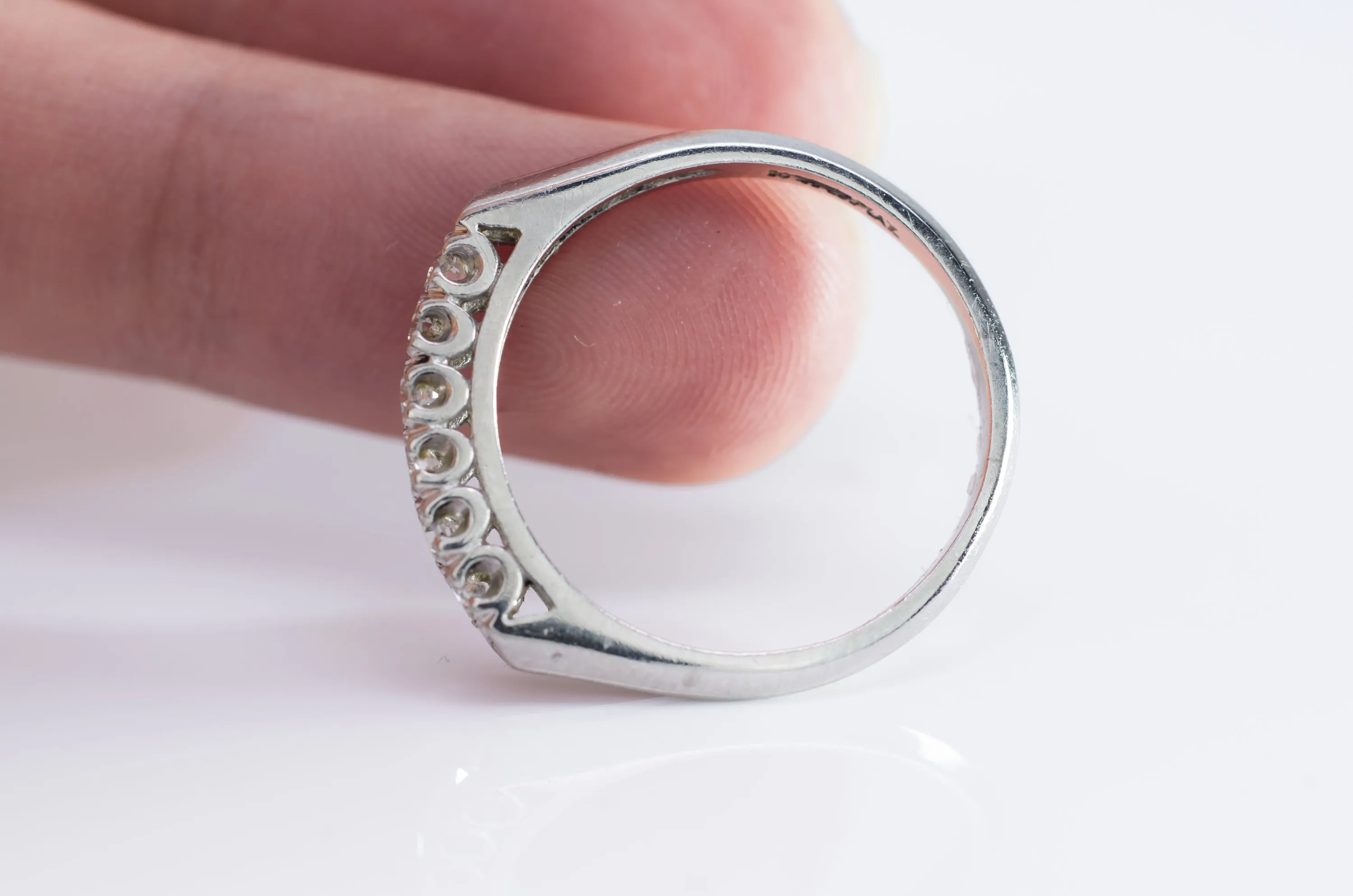 VINTAGE PLATINUM AND SINGLE CUT DIAMOND HALF BAND