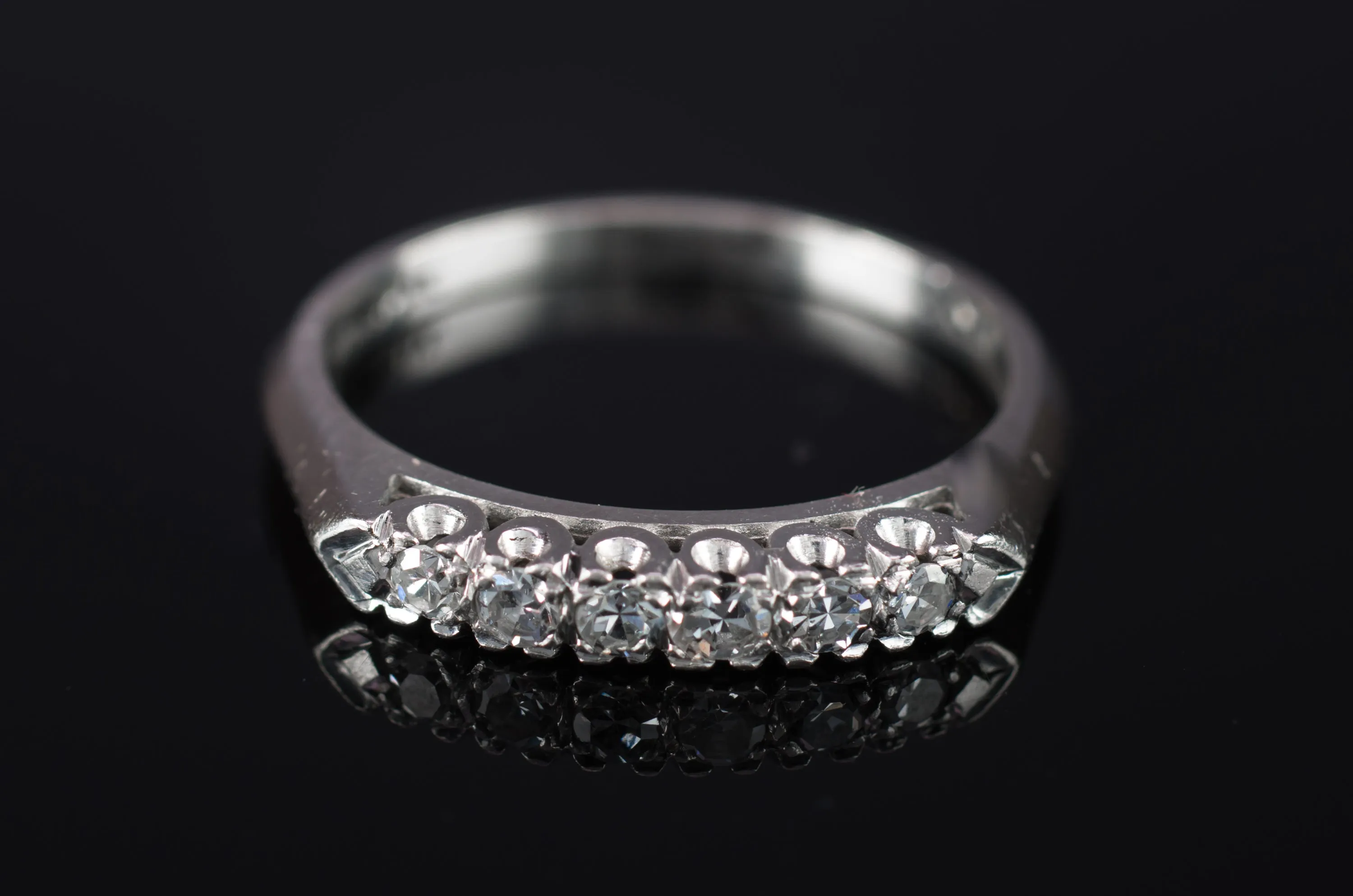 VINTAGE PLATINUM AND SINGLE CUT DIAMOND HALF BAND