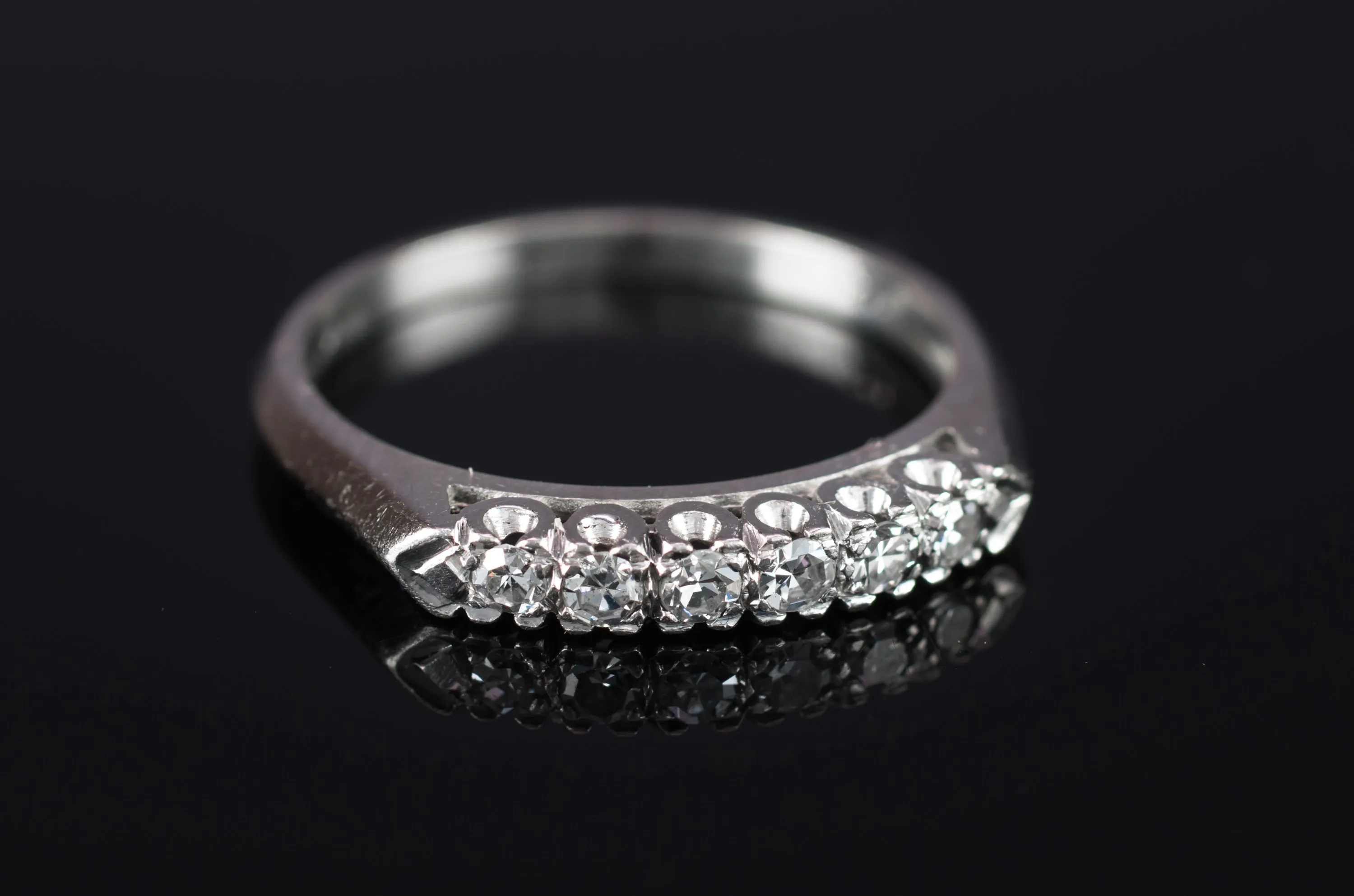 VINTAGE PLATINUM AND SINGLE CUT DIAMOND HALF BAND