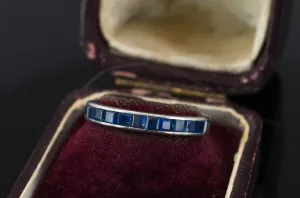 VINTAGE SAPPHIRE ETERNITY RING IN PLATINUM