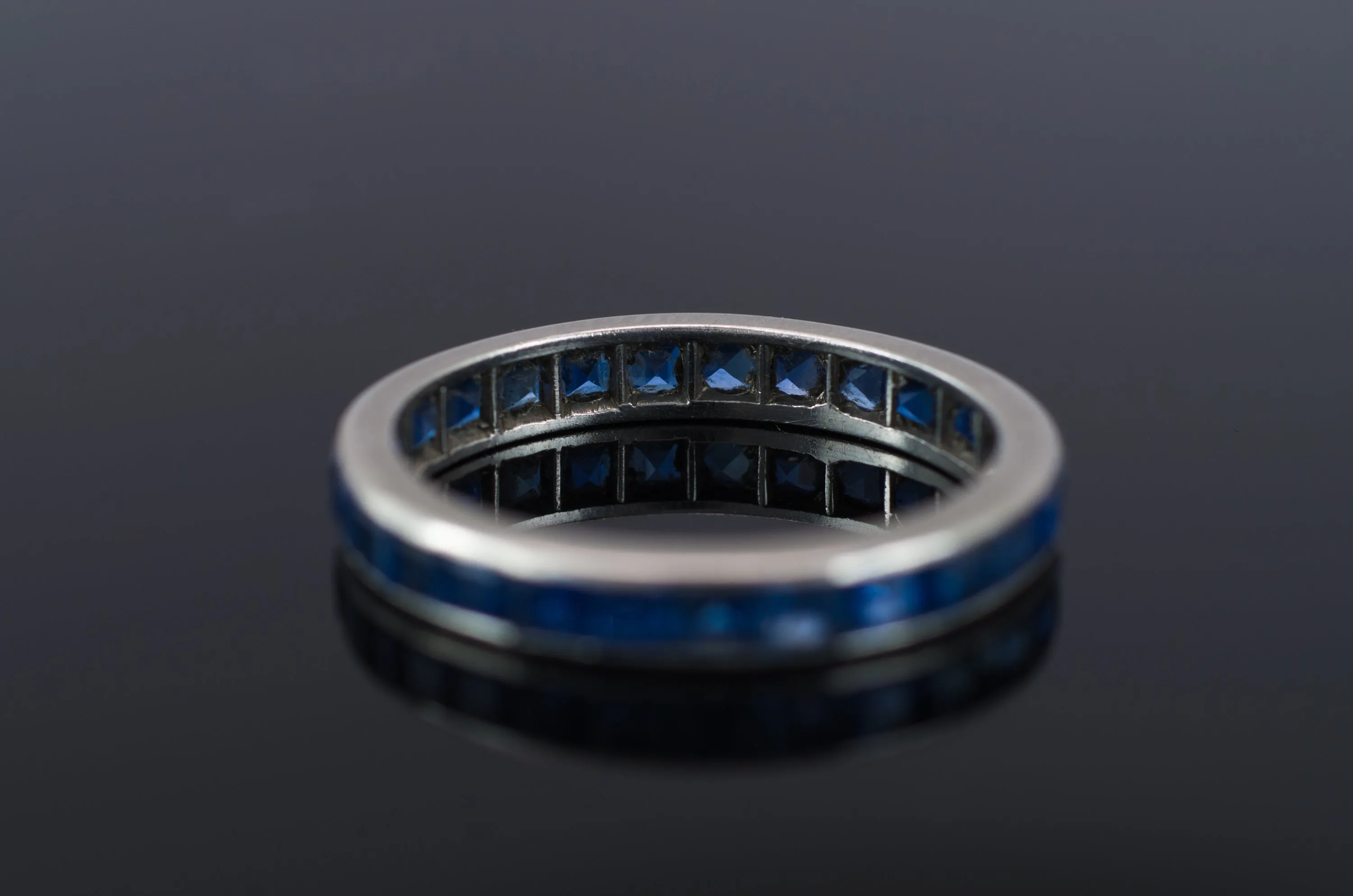 VINTAGE SAPPHIRE ETERNITY RING IN PLATINUM