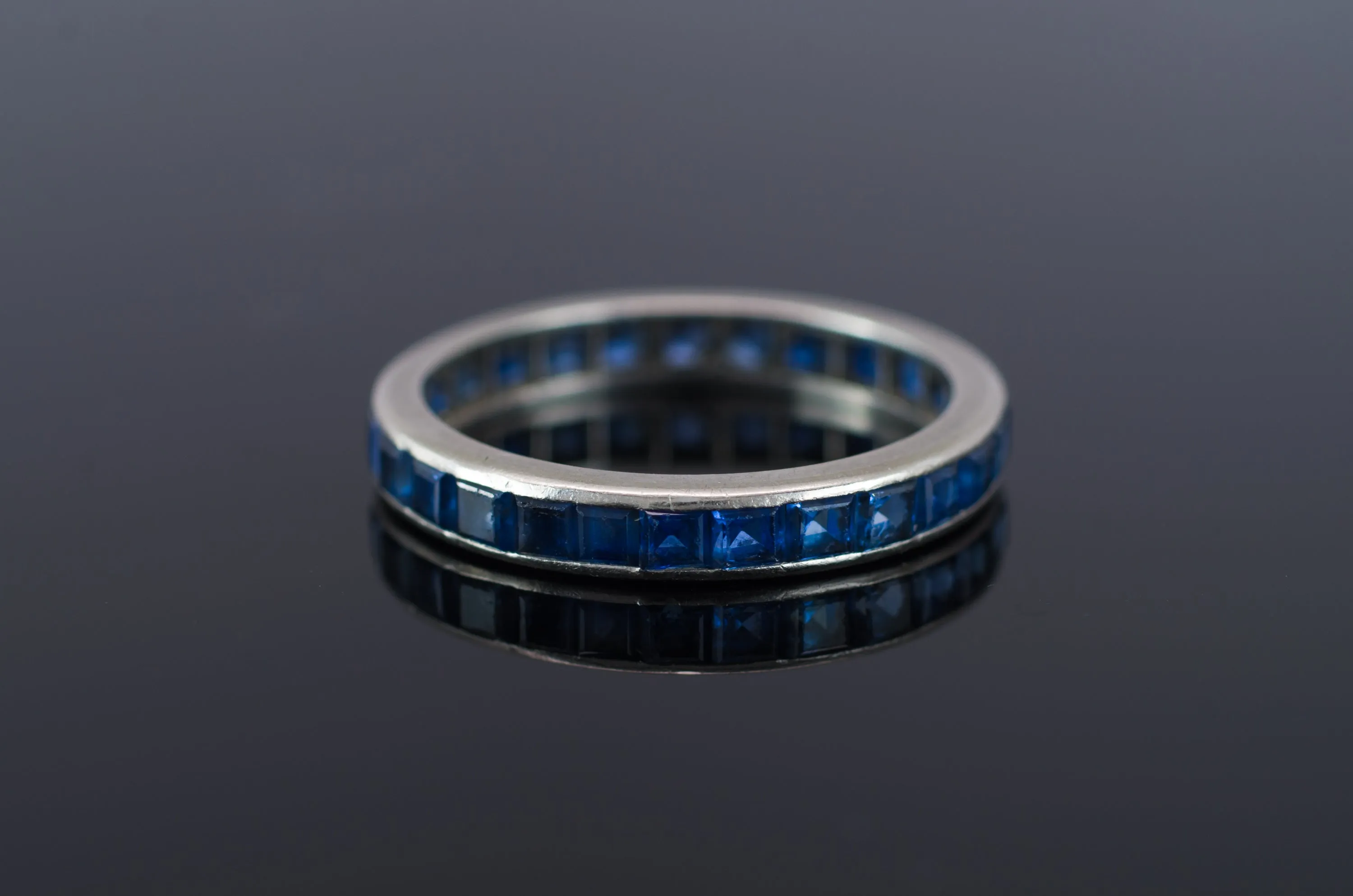 VINTAGE SAPPHIRE ETERNITY RING IN PLATINUM